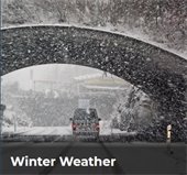 vehicle driving in snow